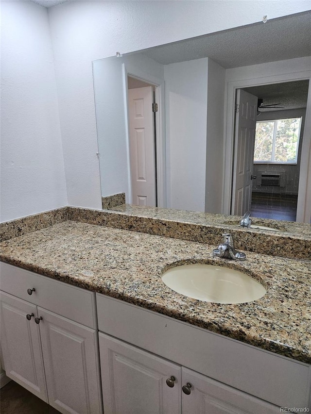 1304 S Parker Rd Unit 13, Denver, CO 80231 - bathroom featuring vanity