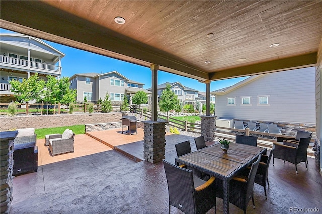 6639 S Vandriver Way, Aurora, CO 80016 - view of patio / terrace with outdoor dining space and a residential view