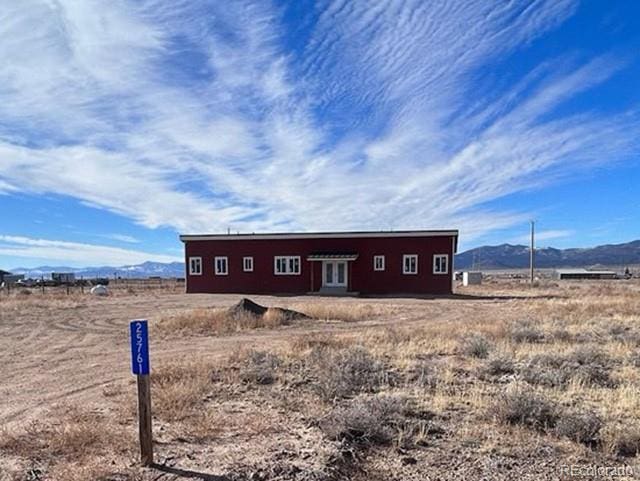 exterior space featuring a mountain view and a rural view