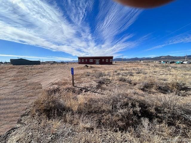 exterior space with a rural view