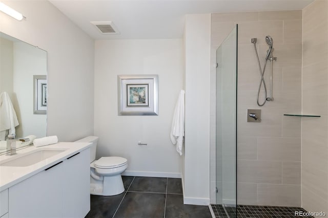 3408 W 18th Ave, Denver, CO 80204 - bathroom featuring vanity, a tile shower, and tile patterned floors