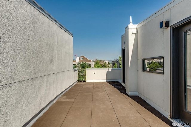 3408 W 18th Ave, Denver, CO 80204 - view of side of property featuring a balcony and stucco siding