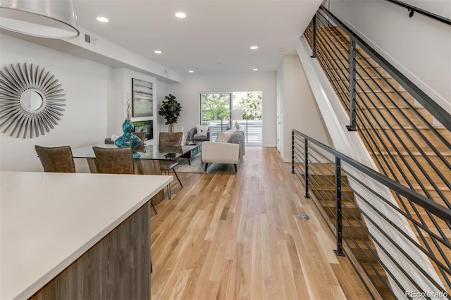 3408 W 18th Ave, Denver, CO 80204 - living area with light wood-type flooring and recessed lighting