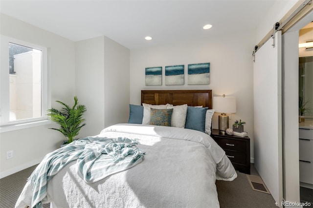 3408 W 18th Ave, Denver, CO 80204 - bedroom with a barn door, carpet floors, and recessed lighting
