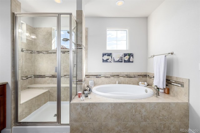 27029 E Irish Pl, Aurora, CO 80016 - bathroom featuring a bath and a stall shower