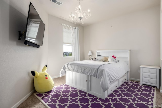 27029 E Irish Pl, Aurora, CO 80016 - bedroom with carpet flooring, baseboards, and a chandelier