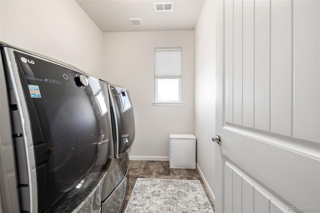 27029 E Irish Pl, Aurora, CO 80016 - laundry room featuring independent washer and dryer and baseboards
