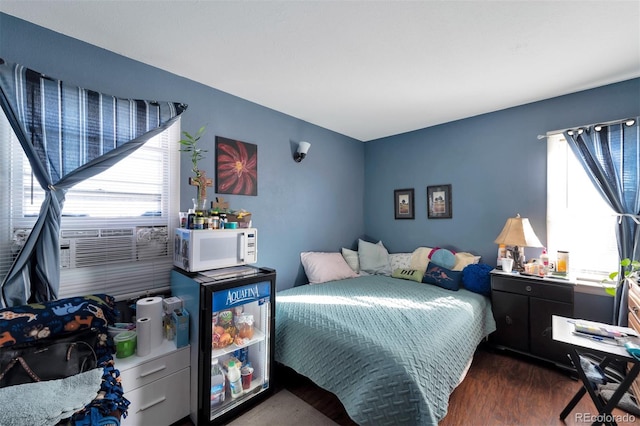 bedroom featuring dark wood-type flooring