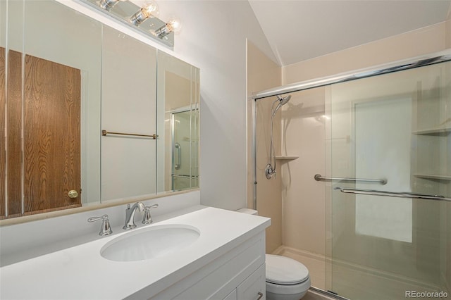 bathroom with an enclosed shower, toilet, vaulted ceiling, and vanity