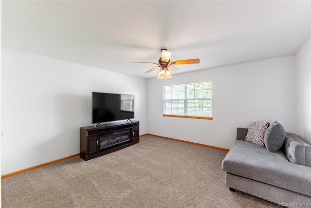 13180 Jasmine St, Thornton, CO 80602 - living room with baseboards, carpet floors, and ceiling fan