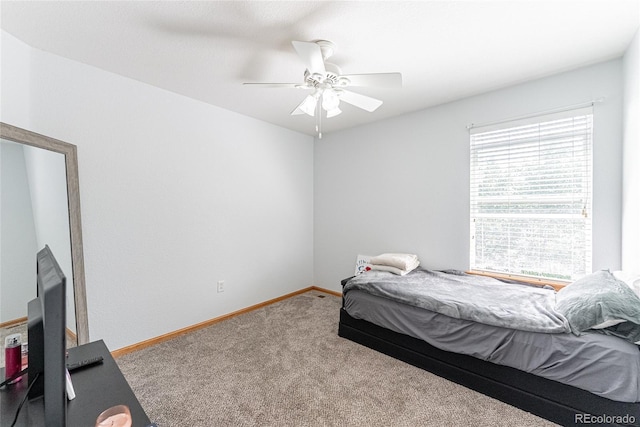 13180 Jasmine St, Thornton, CO 80602 - carpeted bedroom with baseboards and ceiling fan