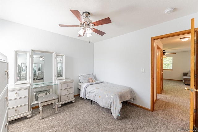 13180 Jasmine St, Thornton, CO 80602 - bedroom featuring carpet flooring, ceiling fan, and baseboards