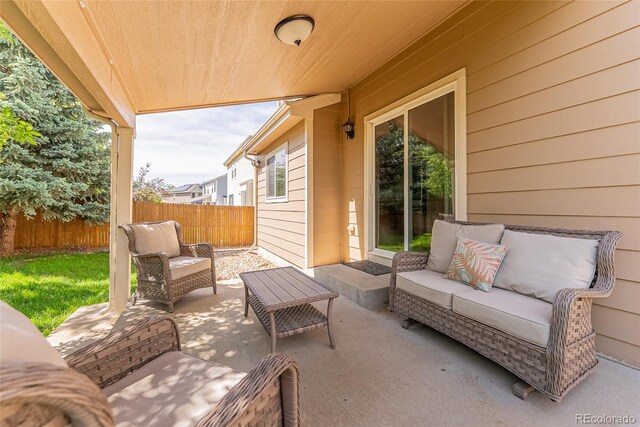 13180 Jasmine St, Thornton, CO 80602 - view of patio with an outdoor living space