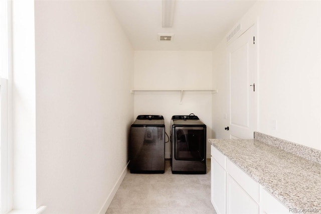 6506 Barnstead Dr, Castle Pines, CO 80108 - washroom featuring washing machine and dryer, baseboards, and light tile patterned flooring