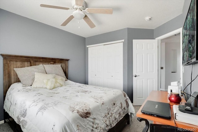 bedroom featuring a ceiling fan and a closet