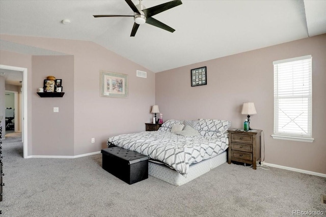 bedroom featuring baseboards, visible vents, carpet floors, and lofted ceiling