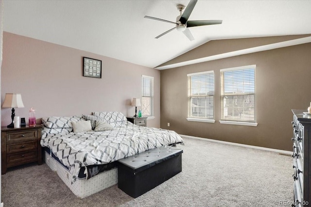 bedroom with baseboards, carpet floors, lofted ceiling, and a ceiling fan