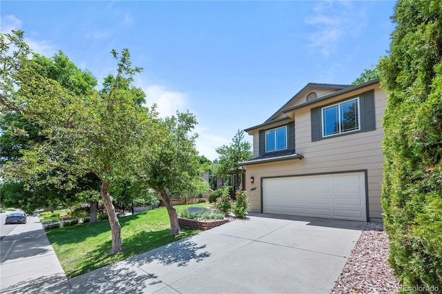 8725 Meadowlark Cir, Highlands Ranch, CO 80126 - view of home's exterior with a garage, concrete driveway, and a yard