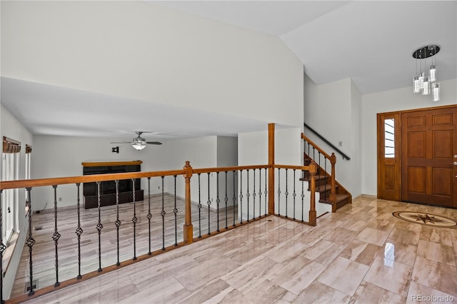 8725 Meadowlark Cir, Highlands Ranch, CO 80126 - foyer with ceiling fan, stairs, a chandelier, and lofted ceiling