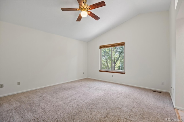 8725 Meadowlark Cir, Highlands Ranch, CO 80126 - spare room with light carpet, ceiling fan, and lofted ceiling