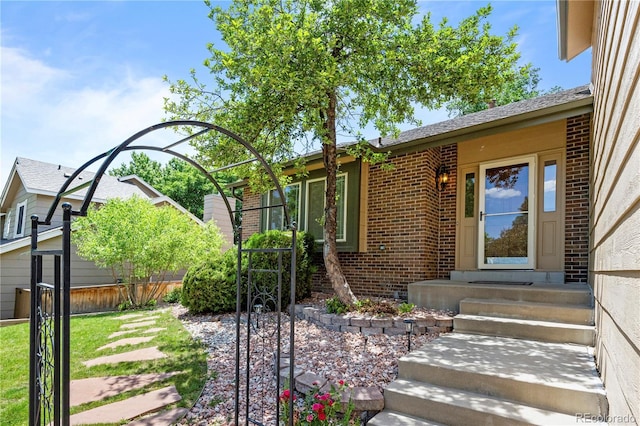8725 Meadowlark Cir, Highlands Ranch, CO 80126 - doorway to property featuring brick siding
