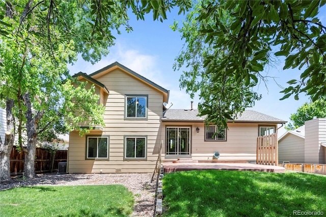 8725 Meadowlark Cir, Highlands Ranch, CO 80126 - back of house featuring a patio and a shingled roof