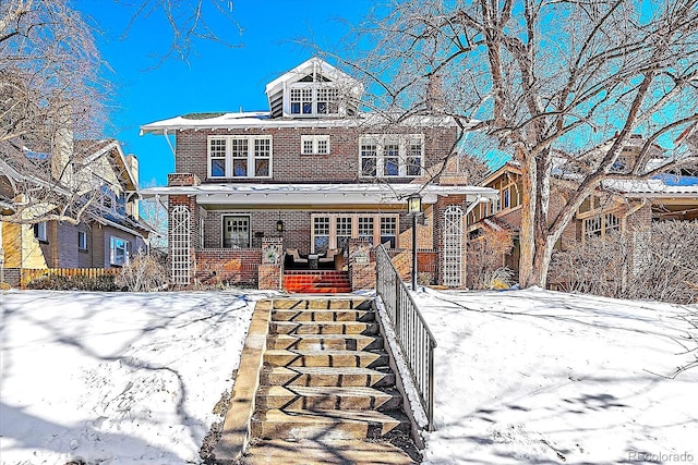 view of front of property featuring covered porch