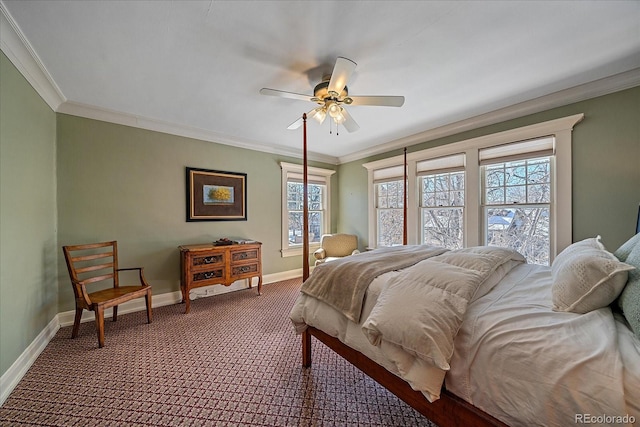 bedroom with ornamental molding, ceiling fan, and carpet flooring