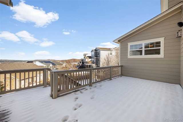 view of snow covered deck