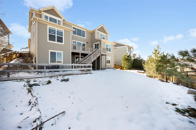 view of snow covered property