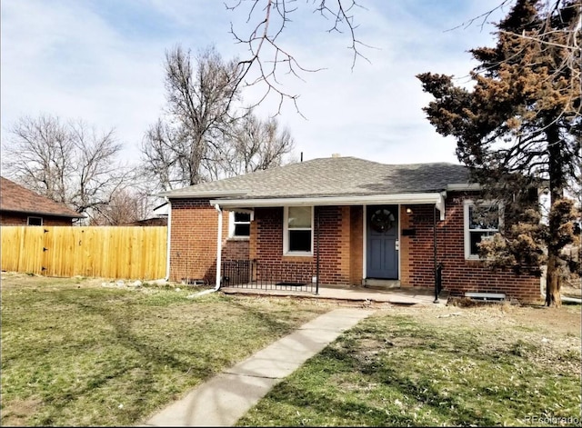 view of front of house with a front lawn