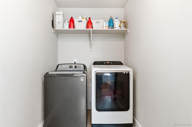 laundry area featuring washing machine and dryer