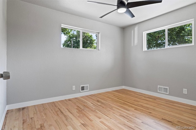 spare room with ceiling fan and light hardwood / wood-style flooring