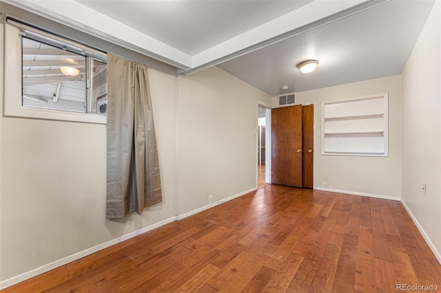 2515 Ames St, Edgewater, CO 80214 - empty room featuring wood finished floors and baseboards