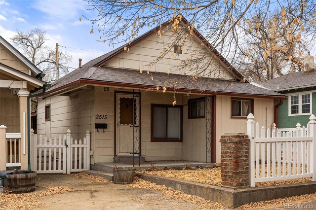 2515 Ames St, Edgewater, CO 80214 - view of front of house featuring a shingled roof