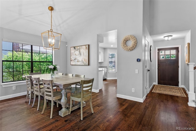 7968 S Trenton St, Centennial, CO 80112 - dining area featuring a chandelier, dark wood-style flooring, and high vaulted ceiling