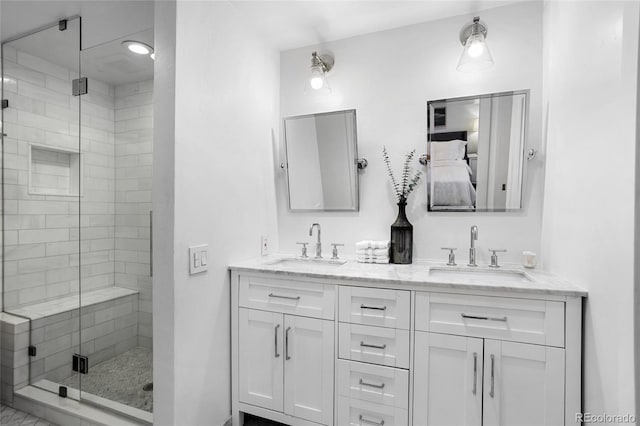 7968 S Trenton St, Centennial, CO 80112 - bathroom with a stall shower, double vanity, and ensuite bathroom