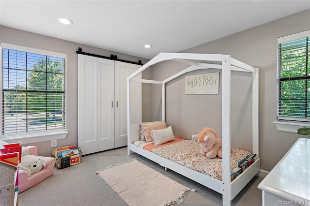 7968 S Trenton St, Centennial, CO 80112 - carpeted bedroom with recessed lighting and a barn door