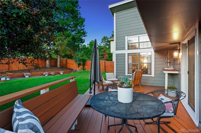 7968 S Trenton St, Centennial, CO 80112 - wooden deck featuring a fenced backyard and outdoor dining space