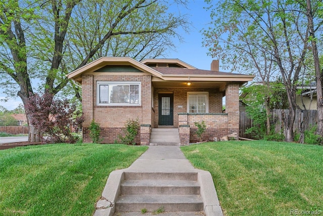 4003 Federal Blvd, Denver, CO 80211 - view of front of property with brick siding and a chimney