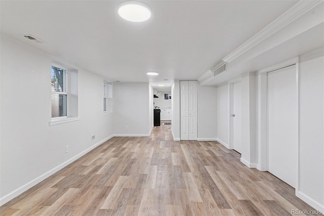 4003 Federal Blvd, Denver, CO 80211 - below grade area featuring light wood finished floors and baseboards