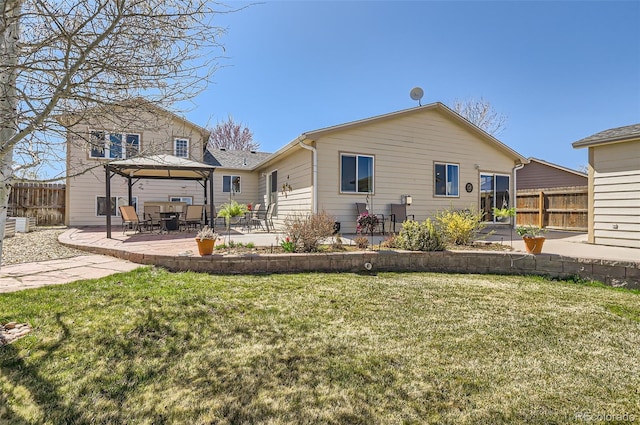 1141 Beech St, Fort Lupton, CO 80621 - back of house featuring a gazebo and a patio