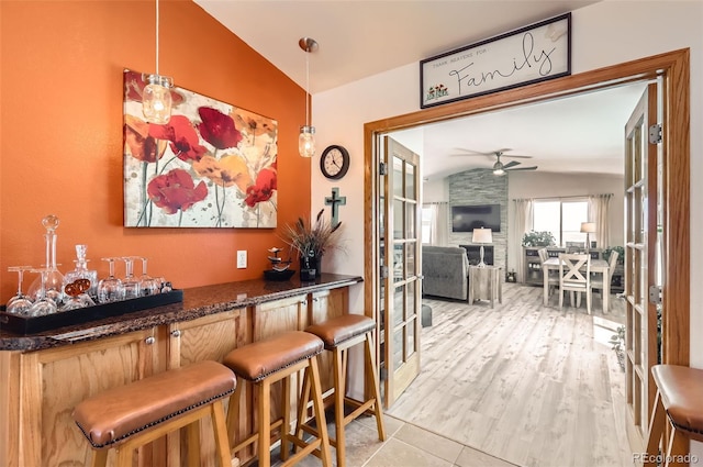 1141 Beech St, Fort Lupton, CO 80621 - indoor dry bar featuring ceiling fan, hanging light fixtures, and light wood-type flooring