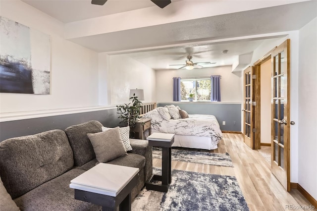 1141 Beech St, Fort Lupton, CO 80621 - living room with ceiling fan, wood finished floors, baseboards, and french doors