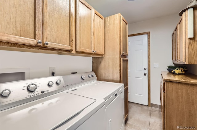 1141 Beech St, Fort Lupton, CO 80621 - washroom featuring washer and dryer, cabinet space, and light tile patterned floors