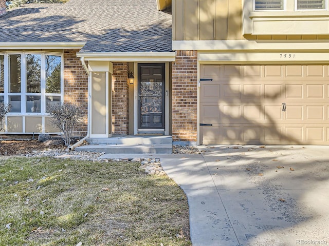 property entrance with a garage