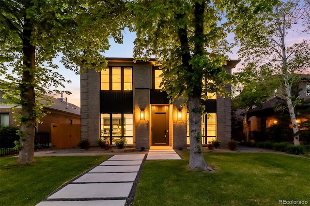 view of front of property featuring brick siding