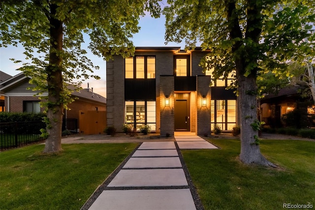 view of front of house featuring brick siding