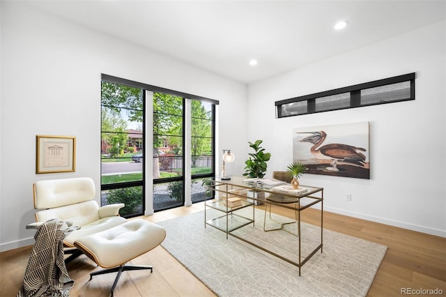 home office with wood finished floors, baseboards, and recessed lighting