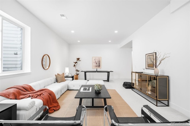 living area featuring recessed lighting